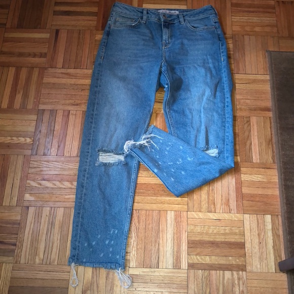 Distressed light blue jeans - Picture 1 of 3